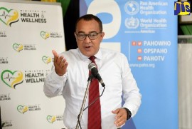 Health and Wellness Minister Dr. Christopher Tufton speaking at the National Health Fund (NHF) Marcus Garvey Drive facility in St. Andrew on Tuesday January 18th. (photo by Dave Reid)
