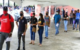 people line up for vaccines under the “walk in” program of the ministry of Health (Photo courtesy Trinidad Express)
