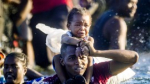 In September, thousands of Haitian asylum seekers crossed the Del Rio river back into Mexico as US border agents began to deport immigrants. (John Moore/Getty Images)